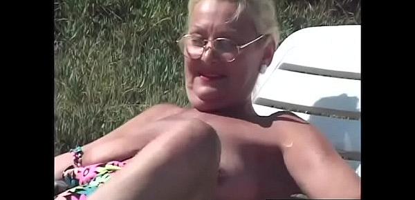  Old lady fucks in backyard by the pool